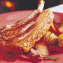 Roast pork with warm apple & chestnut salad