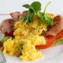 Scrambled eggs with bacon and avocado