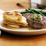 Sirloin steaks with boulangere potatoes