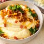 Southern grits with spicy bacon and corn