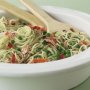 Spaghetti with salmon, mint and peas