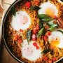 Spicy rice and sweet potato biryani with baked eggs