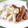 Spicy sausages with warm potato salad