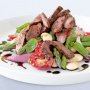 Steak with butter bean & tomato salad