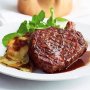 Steak with quick sauce bordelaise and boulangere potatoes
