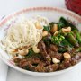 Stir-fried beef, broccoli and cashews with egg noodles