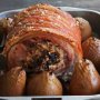 Stuffed pork loin with roasted baby pears