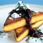 Three-cheese polenta triangles with caramelised onions