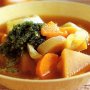 Winter vegetable soup with chive pesto