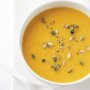 Yellow split-pea soup with toasted pepitas and sunflower seeds