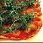 Tomato, bocconcini and rocket pizzas