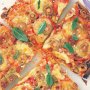 Tomato, olive & bocconcini pizzas