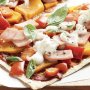 Pumpkin and bacon pizzas with walnut salad