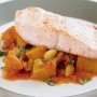 Salmon with spiced pumpkin and tomatoes