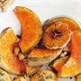 Sticky pumpkin wedges with roasted garlic