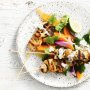 Spicy grilled chicken skewers with red papaya salad