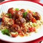 Pork stuffing meatballs with tomato couscous